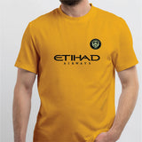 Back View: Back of yellow football jersey featuring 'DE BRUYNE 17' printed in bold black lettering