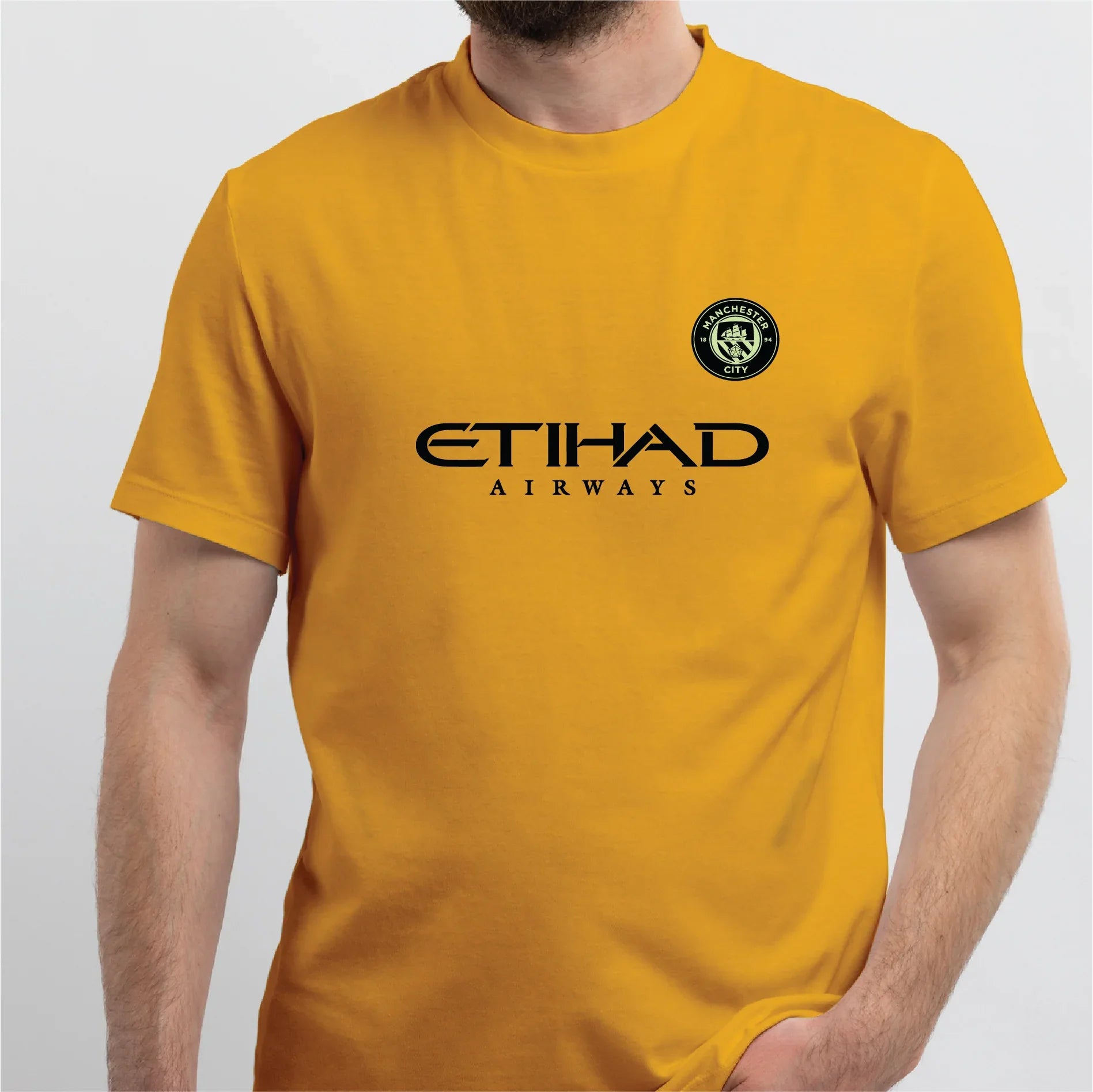Back View: Back of yellow football jersey featuring 'DE BRUYNE 17' printed in bold black lettering